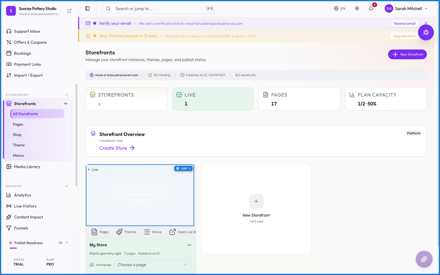 The Storefronts page showing storefront cards with an infrastructure strip displaying the primary domain, SSL status, and last published date